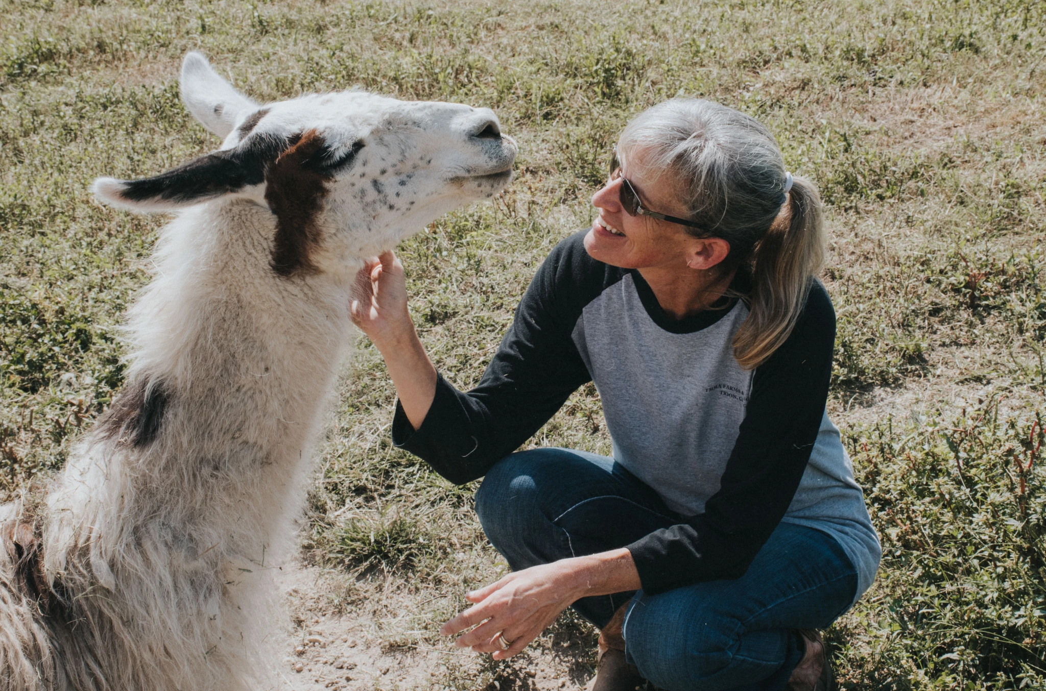 Maryann Marsh, owner of TMMA Farms located in Trion, Georgia enjoys a moment with her llama, Shaggy.